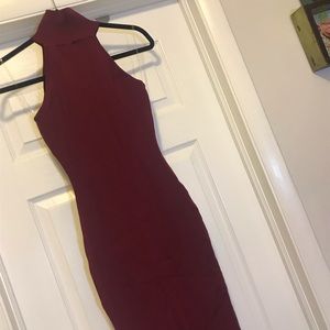 Burgundy high neck bodycon dress.